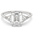 three stone emerald cut ring